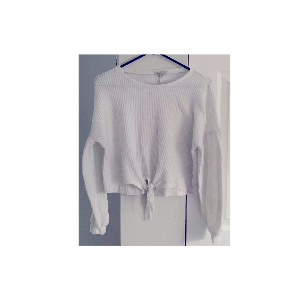White sweater.
